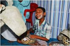 A participant from mask making workshop, 2014