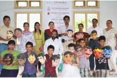 Group photograph from mask making workshop, 2014