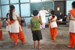 Shri Pabitrapran Bora imparting theoretical knowledge to the participants during Ankiya Bhaona workshop, 2014